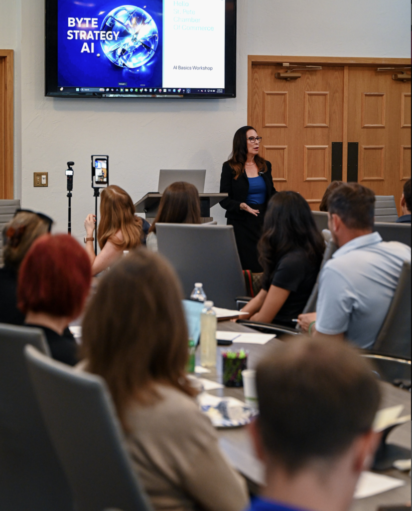 AI Solution Architect, female Founder, René Clayton presenting an AI strategy session to local small business owners at the St. Petersburg Chamber of Commerce.